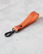 Load image into Gallery viewer, Leather Keyring, Orange, Black Hardware
